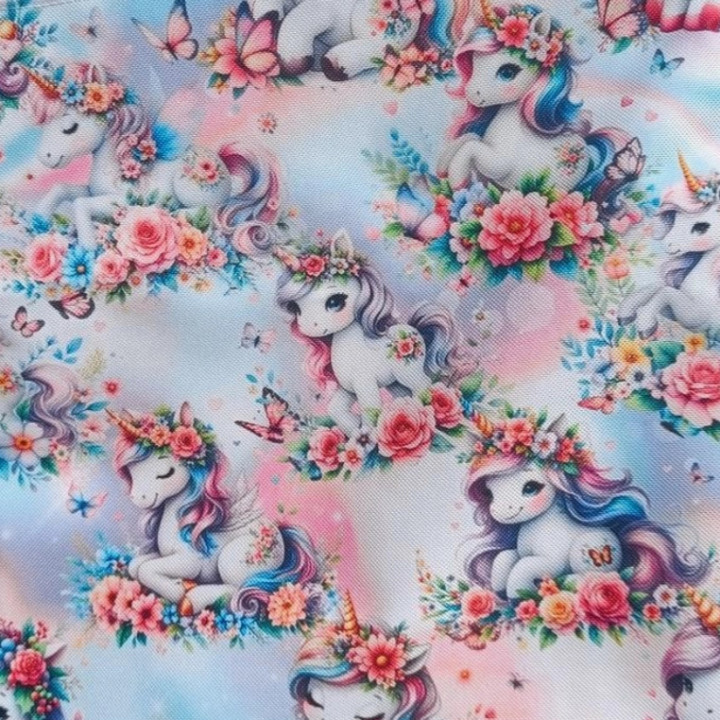 Bolsita impermeable infantil unicornios flores