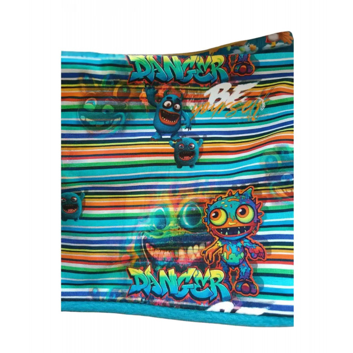 Foto de la tela estampada con monstruos de colores en diferentes expresiones.