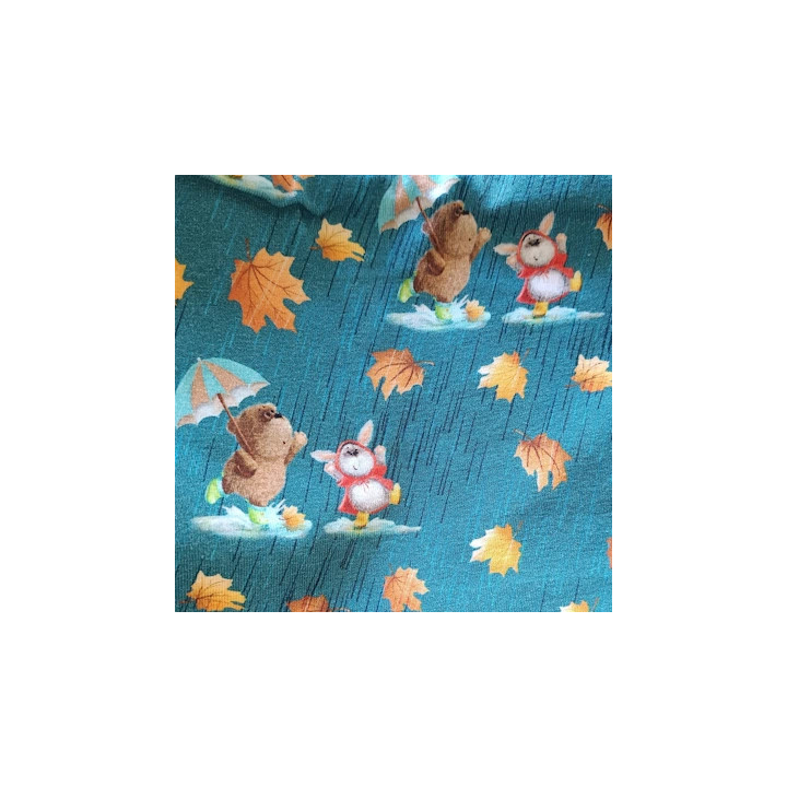 Detalle del tejido del cuello polar Ositos Otoño con ositos, conejitos y hojas cayendo