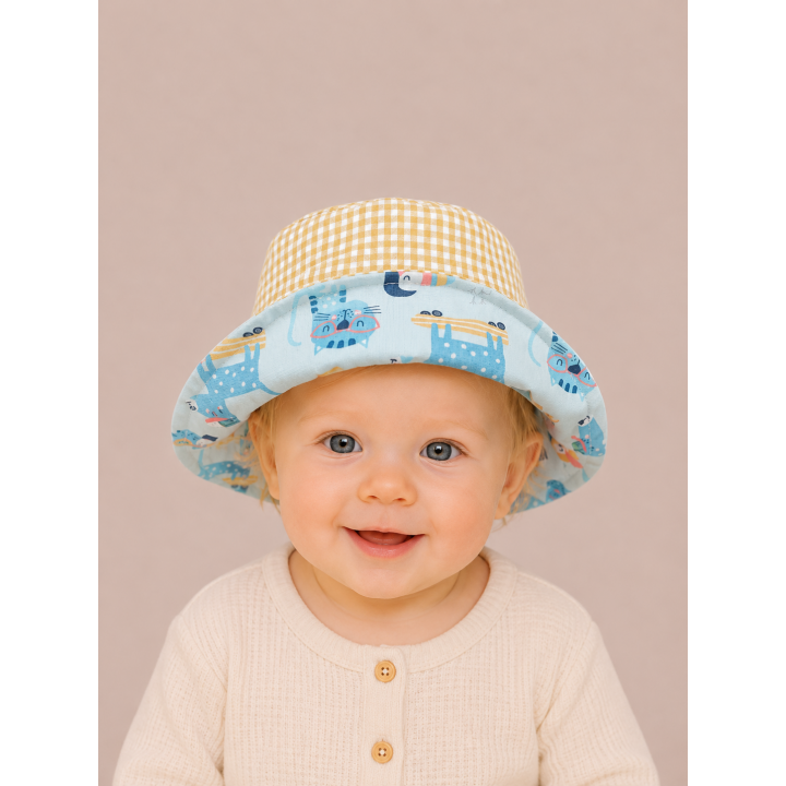 Reverso del gorrito de pescador Tucán con tela combinada – By.Cuqui