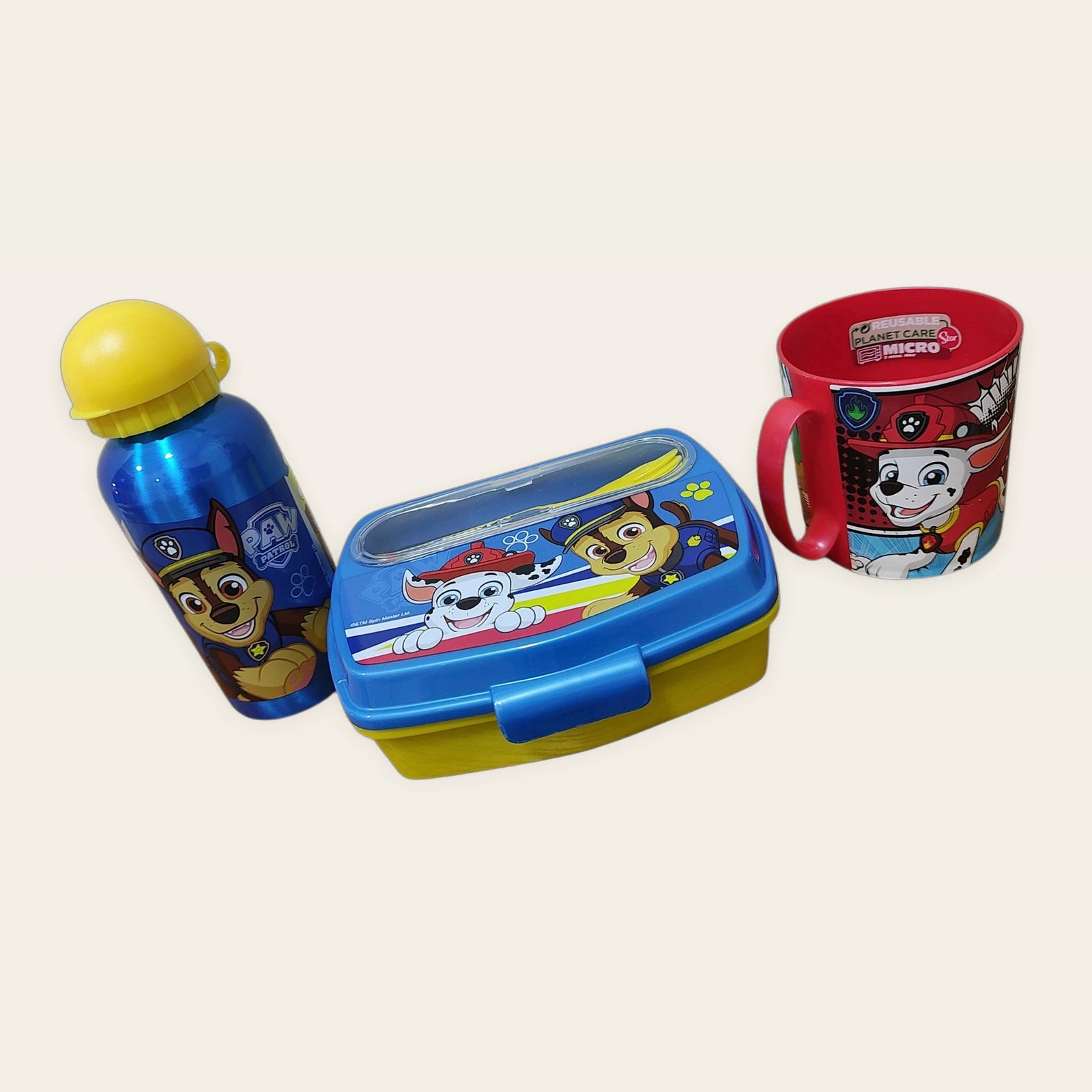 Pack Vuelta al Cole Patrulla Canina con taza, sandwichera con cubiertos y botella de aluminio.