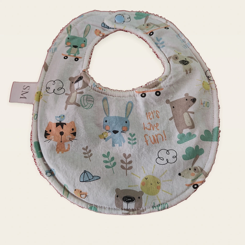 Babero impermeable 0–6 meses Animalitos divertidos con rizo de bambú beige y snap blanco, vista frontal [Variant: Celeste]