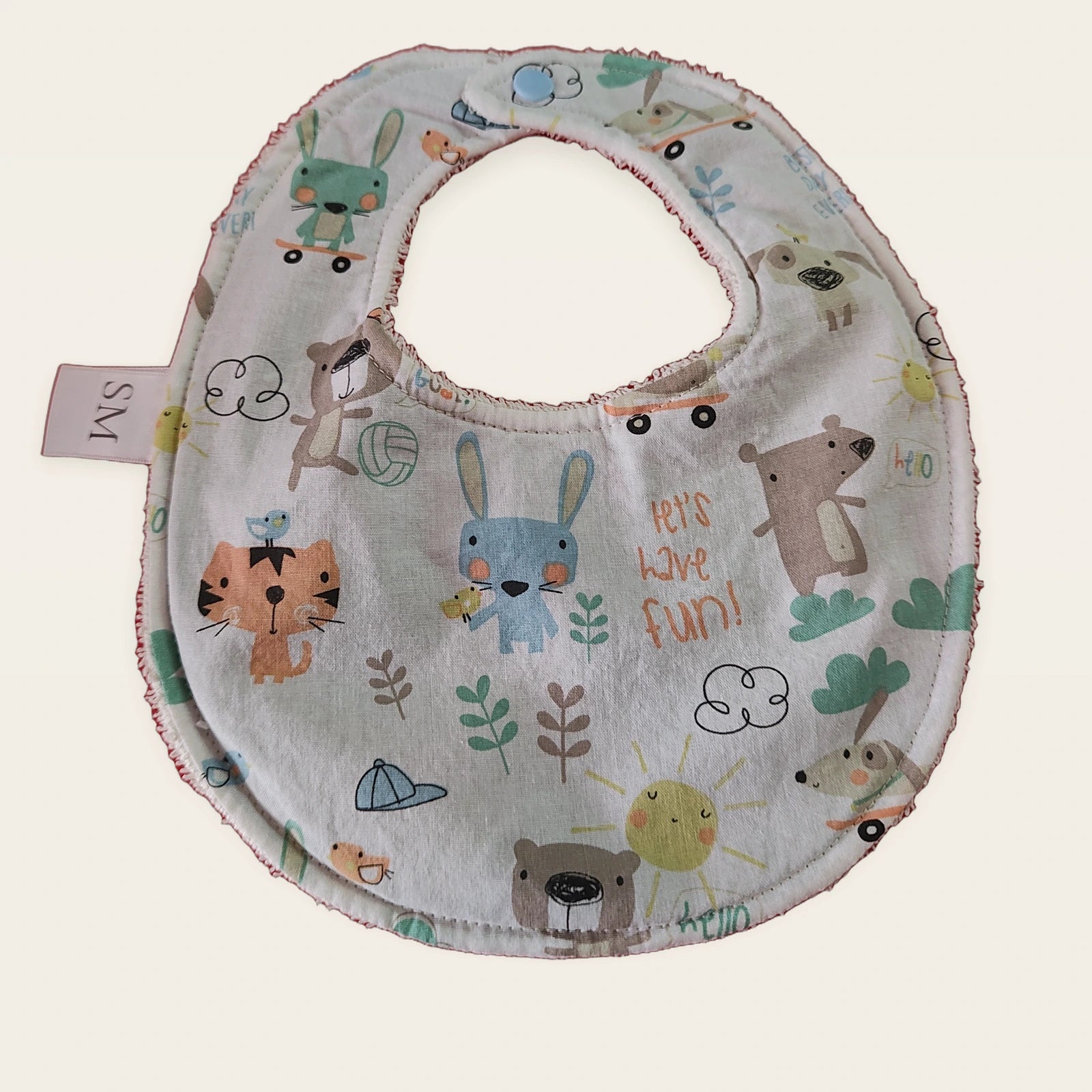 Babero impermeable 0–6 meses Animalitos divertidos con rizo de bambú beige y snap blanco, vista frontal [Variant: Celeste]