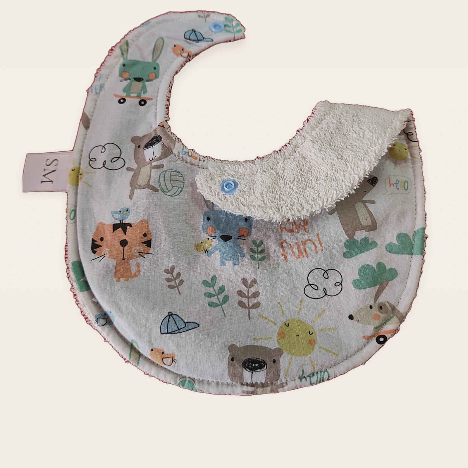 Babero impermeable 0–6 meses Animalitos divertidos con snap celeste y una pata doblada para mostrar el rizo de bambú beige [Variant: Celeste]