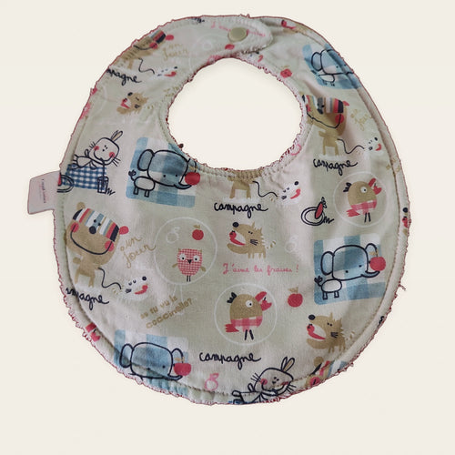 Babero impermeable 0–6 meses Animalitos franceses con rizo de algodón blanco roto, vista frontal