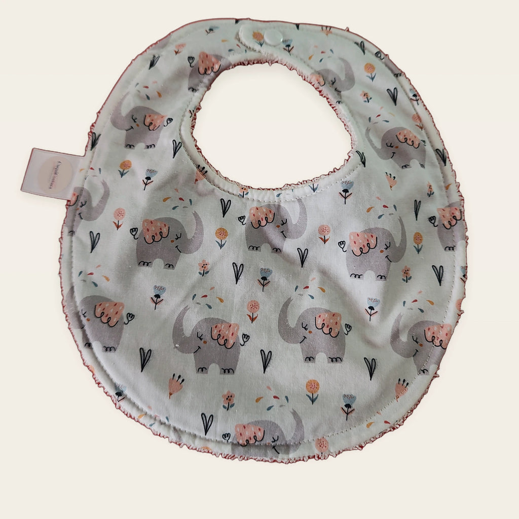 Babero impermeable 0–6 meses Cuquielefantes con rizo de algodón blanco roto, vista frontal
