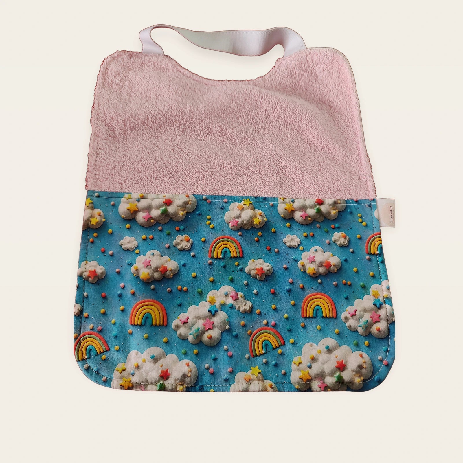 Babero infantil Cielo con rizo de algodón rosa y cuello elástico