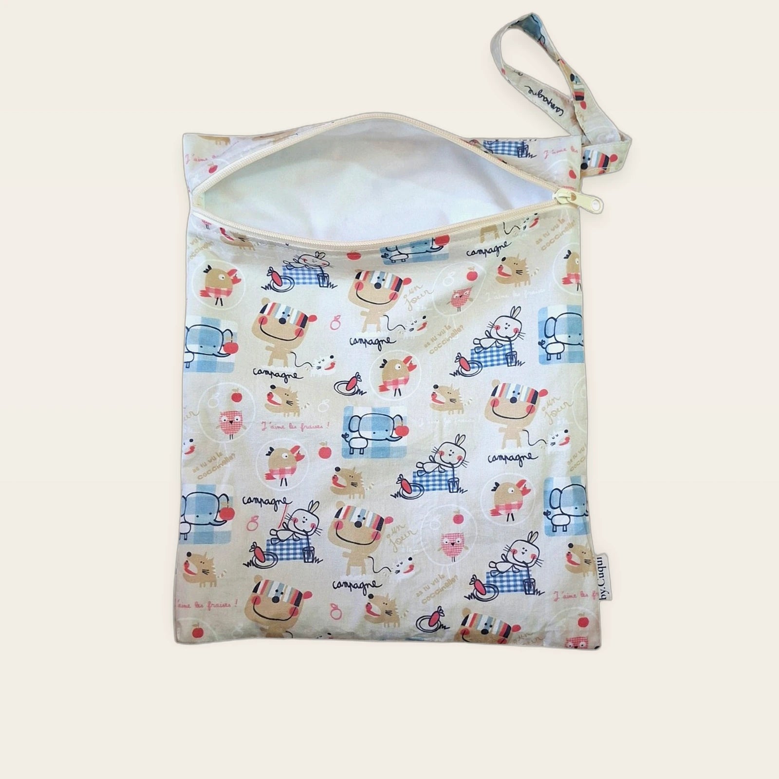 Bolsa impermeable Animalitos franceses con cremallera beige abierta, vista frontal