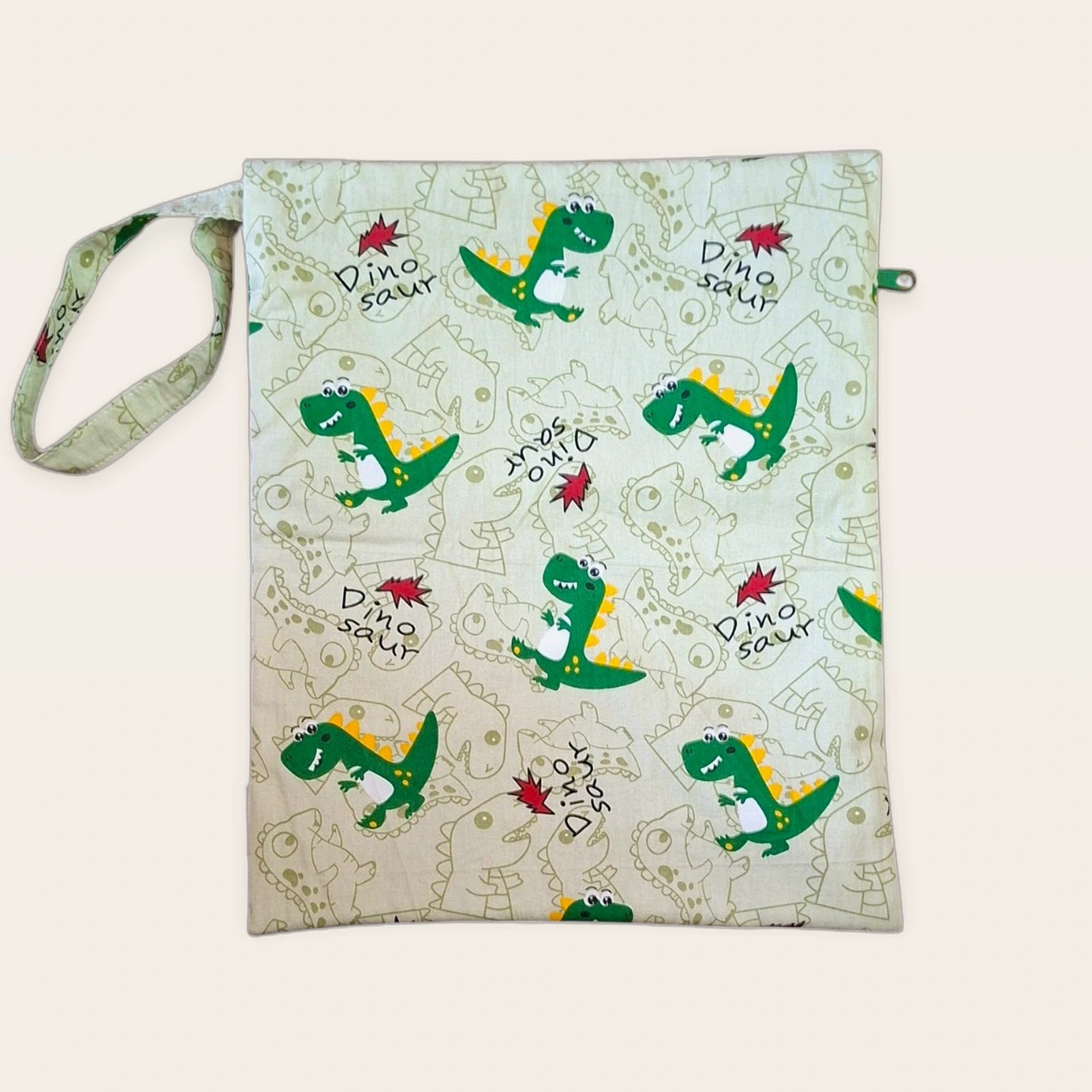Bolsa impermeable Dinosaurios verdes con cremallera verde, vista trasera con asa