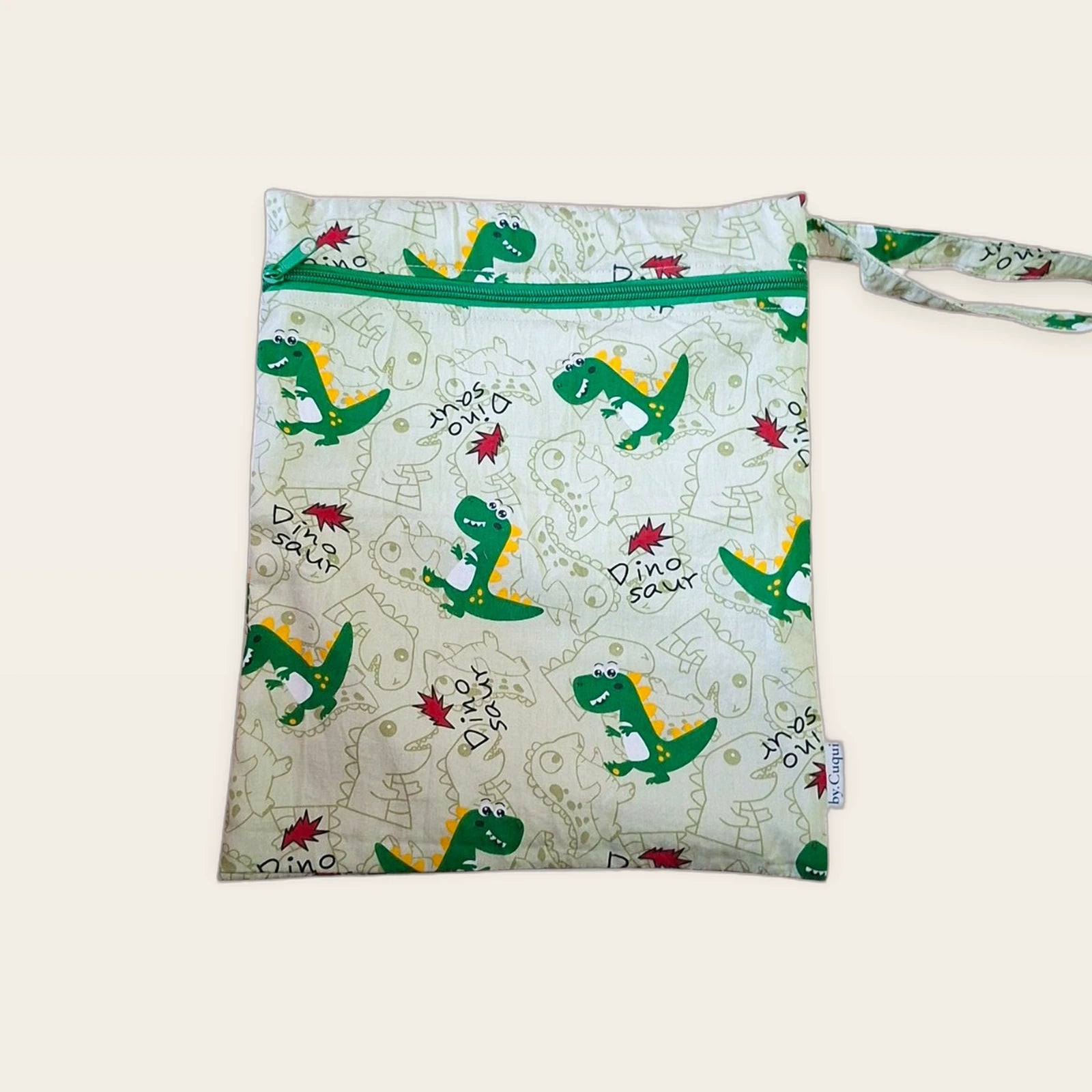 Bolsa impermeable Dinosaurios verdes con cremallera verde, vista frontal