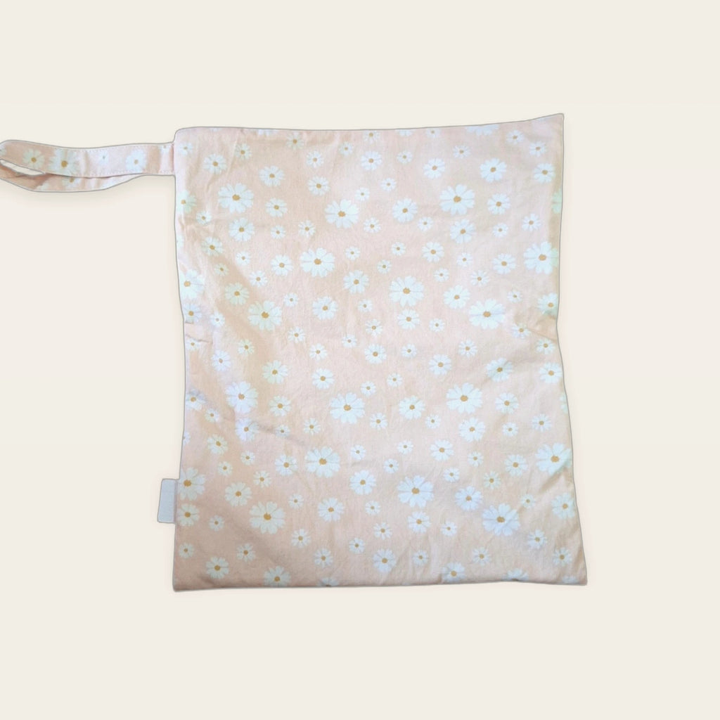 Bolsa impermeable Margaritas con cremallera blanca, vista trasera con asa