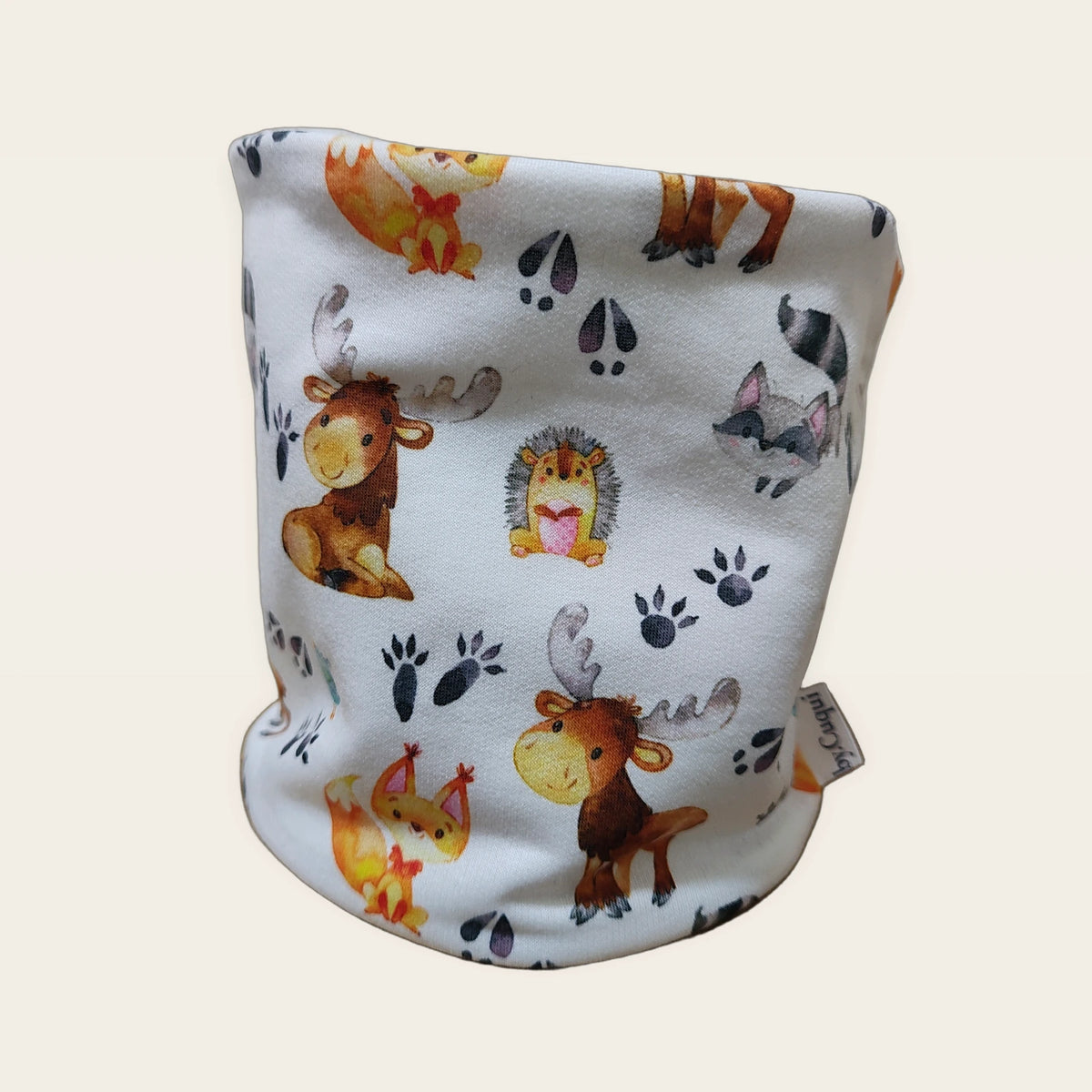 Braga de cuello infantil Animalitos y huellas estirada, vista del anverso estampado [Variant: Beige]