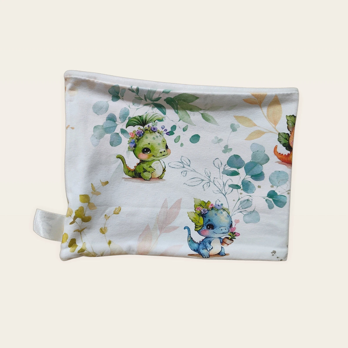 Braga de cuello infantil Dragoncitos colocada en plano [Variant: Blanco]