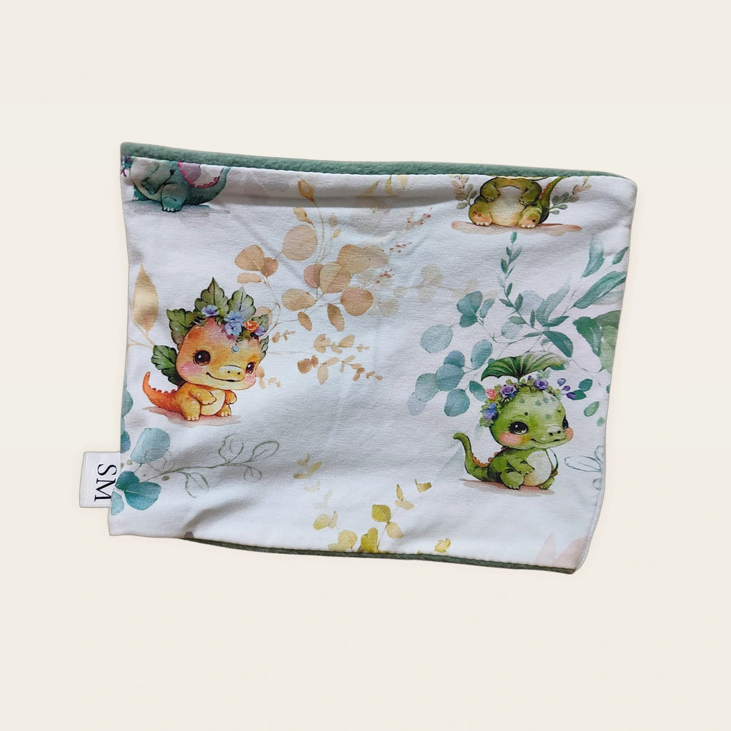 Braga de cuello infantil Dragoncitos colocada en plano [Variant: Pale mint]