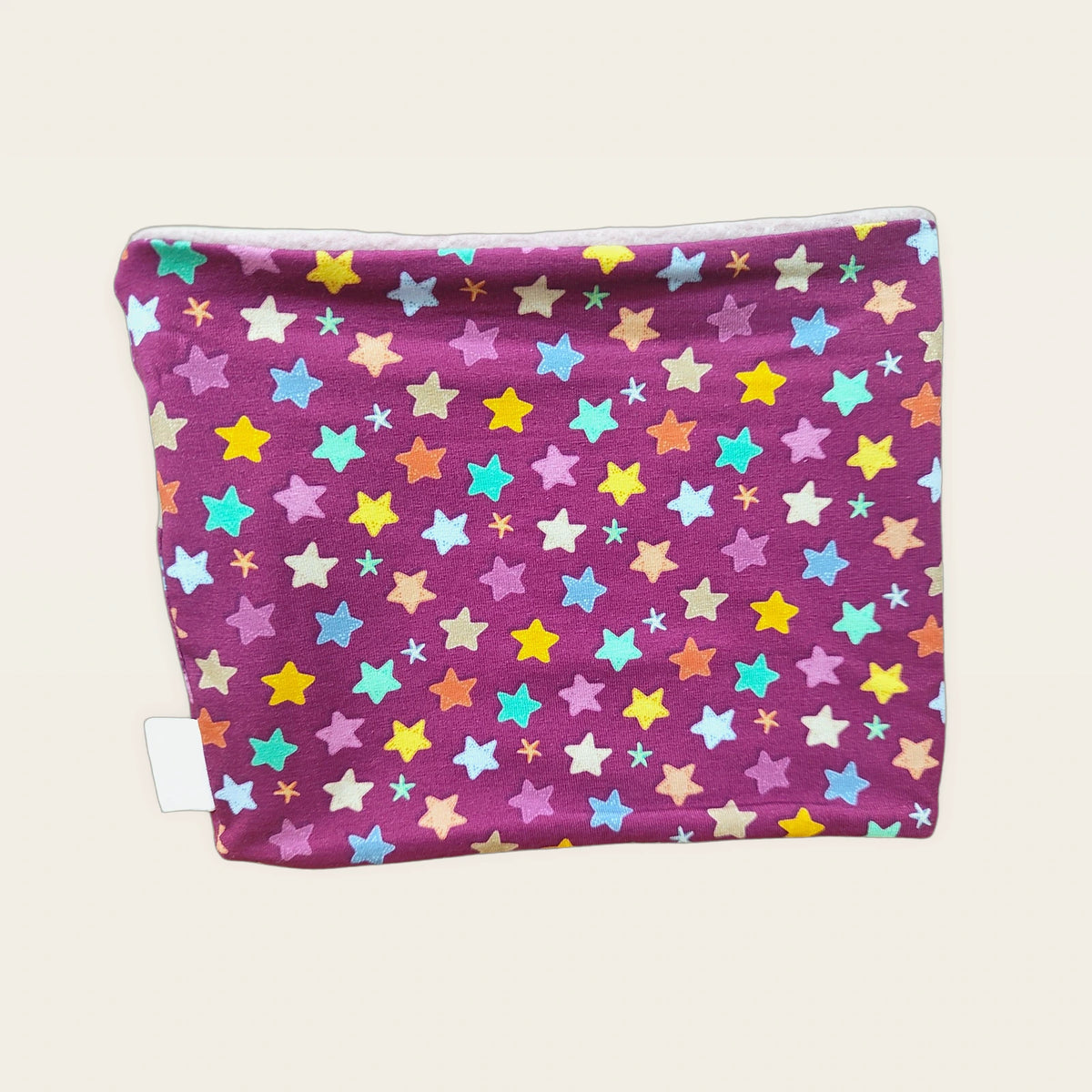Braga de cuello infantil Estrellas colocada en plano [Variant: Nude]