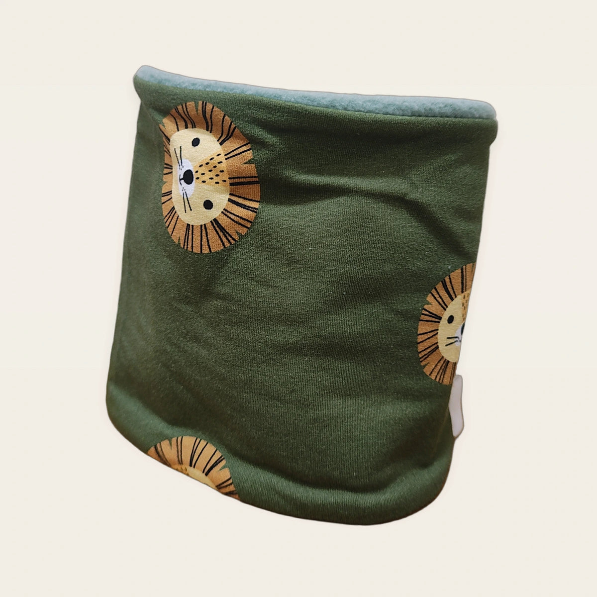 Braga de cuello infantil León verde estirada, vista del anverso estampado [Variant: Pale mint]