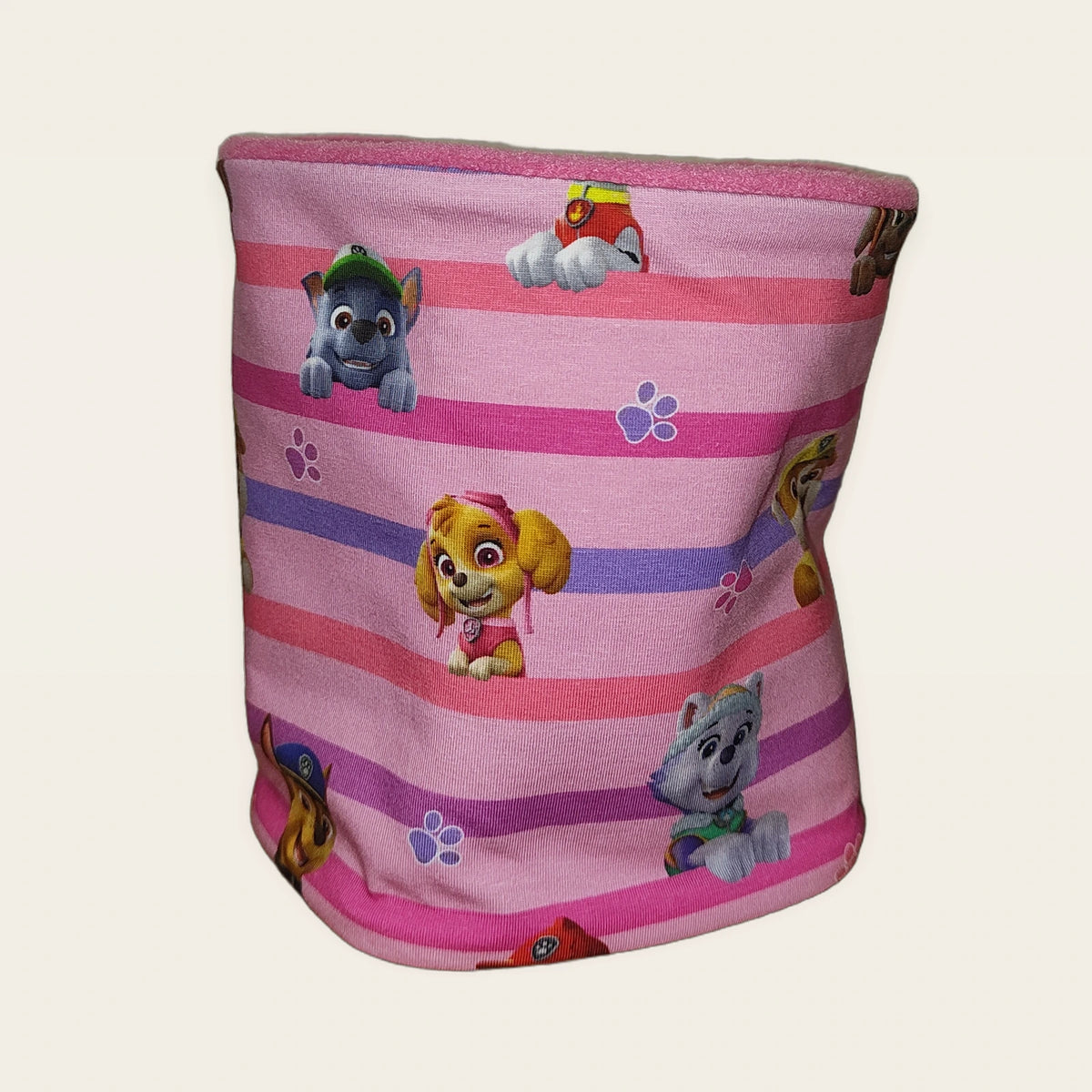 Braga de cuello infantil Perretes rayas rosa estirada, vista del anverso estampado [Variant: Fucsia]
