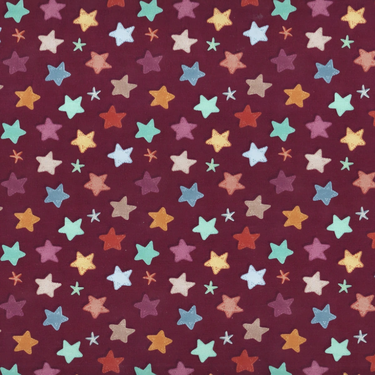 Detalle del estampado de estrellas en el tejido de punto de una braga de cuello infantil